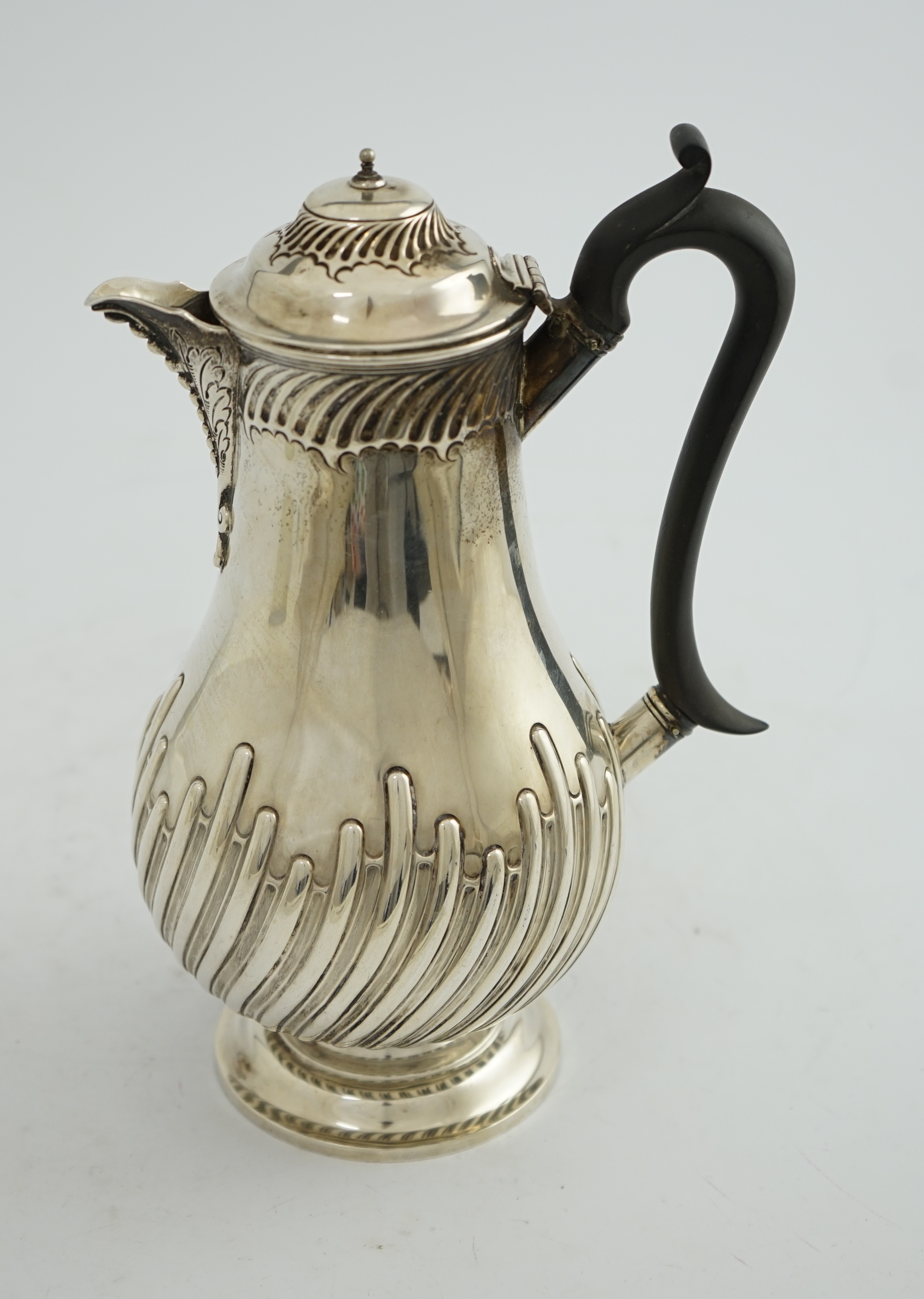 A late Victorian demi-spiral fluted hot water pot, by James Deakin & Sons Ltd